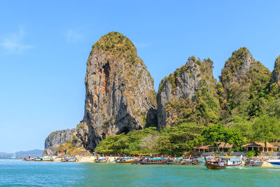 Panoramic view of sea and rocks against sky