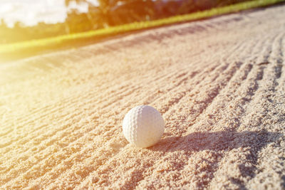 Close-up of ball on sand