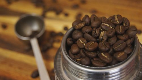 Close-up of coffee beans on table