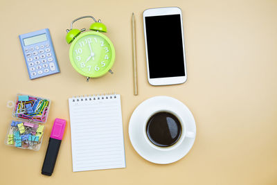 High angle view of coffee cup on table