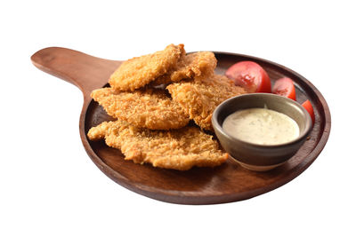 High angle view of breakfast on table against white background