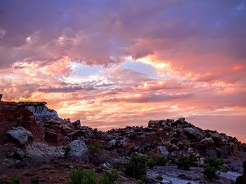 Scenic view of landscape against sky during sunset