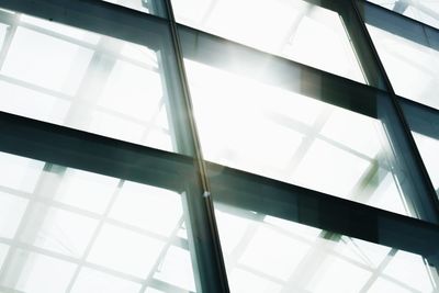 Low angle view of glass window in building