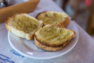 Close-up of bread in plate on table