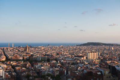 High angle view of townscape against sky during sunset