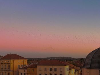 Scenic view of residential district against sky