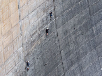 High angle view of people walking on floor