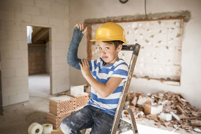 Man working at construction site at home