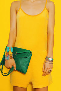 Bright summer. bright colors. yellow and green clothing fashion accessories lady.