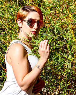 Portrait of young woman on sunglasses