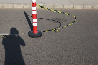 High angle view of bicycle sign on road