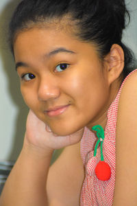 Close-up portrait of smiling girl