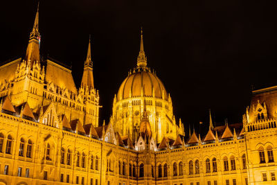 Low angle view of cathedral against sky at night