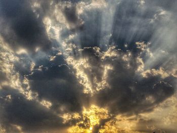 Low angle view of clouds in sky during sunset