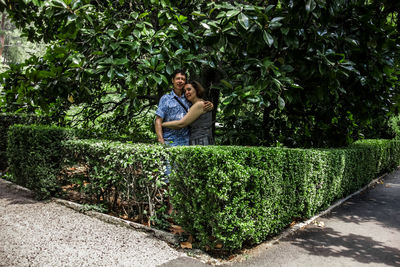 Portrait of couple standing in park