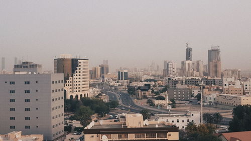 Cityscape against clear sky