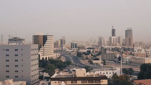 Cityscape against clear sky