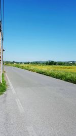 Empty road in field