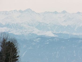 Scenic view of snow covered mountains