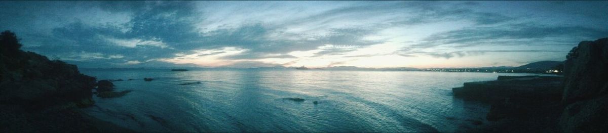 Scenic view of sea at sunset