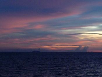 Scenic view of sea against dramatic sky