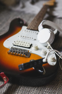 High angle view of guitar on table