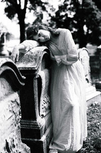 Close-up of angel statue in cemetery