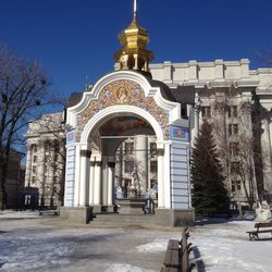 Facade of building against clear blue sky