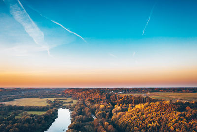 Scenic view of landscape against sky during sunset