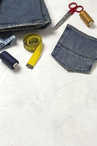 High angle view of yellow and pen on table