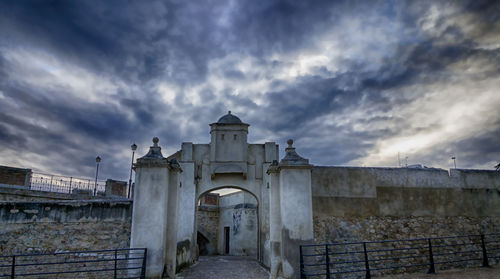 Built structure against cloudy sky