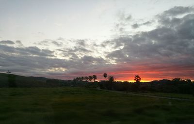 Scenic view of landscape against sky during sunset