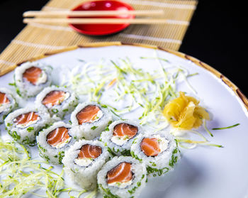 Close-up of sushi served on table
