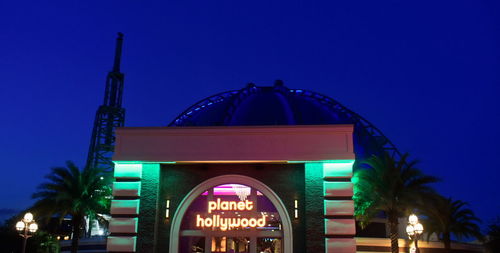 Low angle view of illuminated building at night