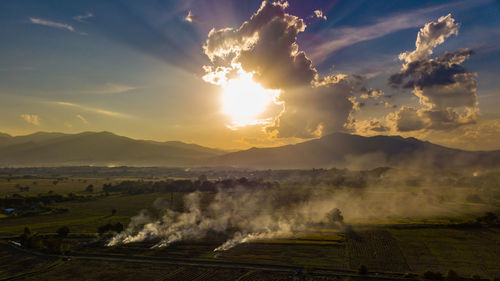 Scenic view of landscape against sky during sunset