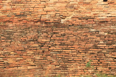 Full frame shot of red brick wall