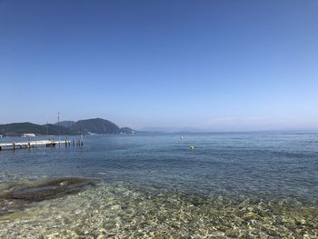 Scenic view of sea against clear sky