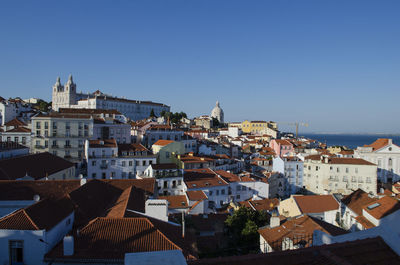 Town against clear sky