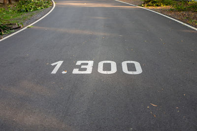 High angle view of text on road