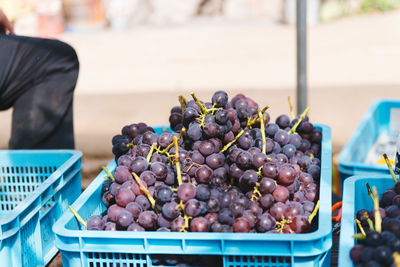 High angle view of grapes in container