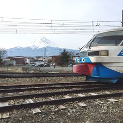Railroad track against sky