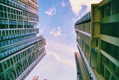 Low angle view of modern buildings against sky