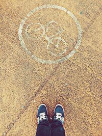 Low section of person standing on ground