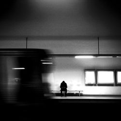 Woman in dark room