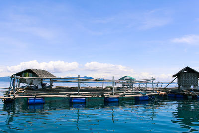 Scenic view of sea against blue sky