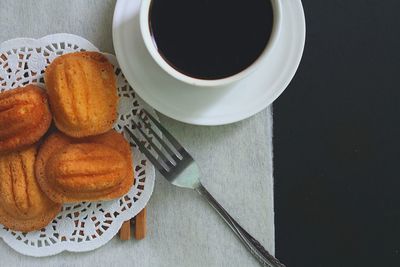 High angle view of coffee cup on table