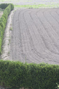 High angle view of road marking on field