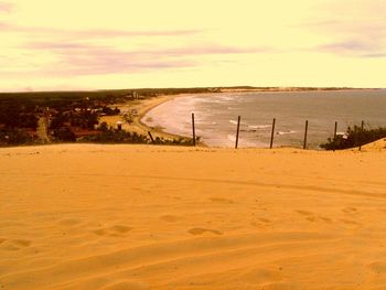 View of beach at sunset
