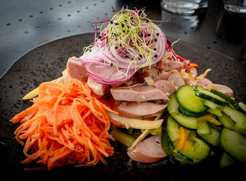 High angle view of chopped vegetables in plate