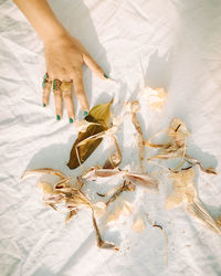 High angle view of woman holding umbrella